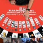 Black jack dealing on red table